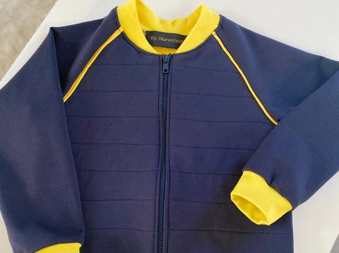 DIY: Sy en quiltet børnejakke med fleecefor og piping – trin for trin