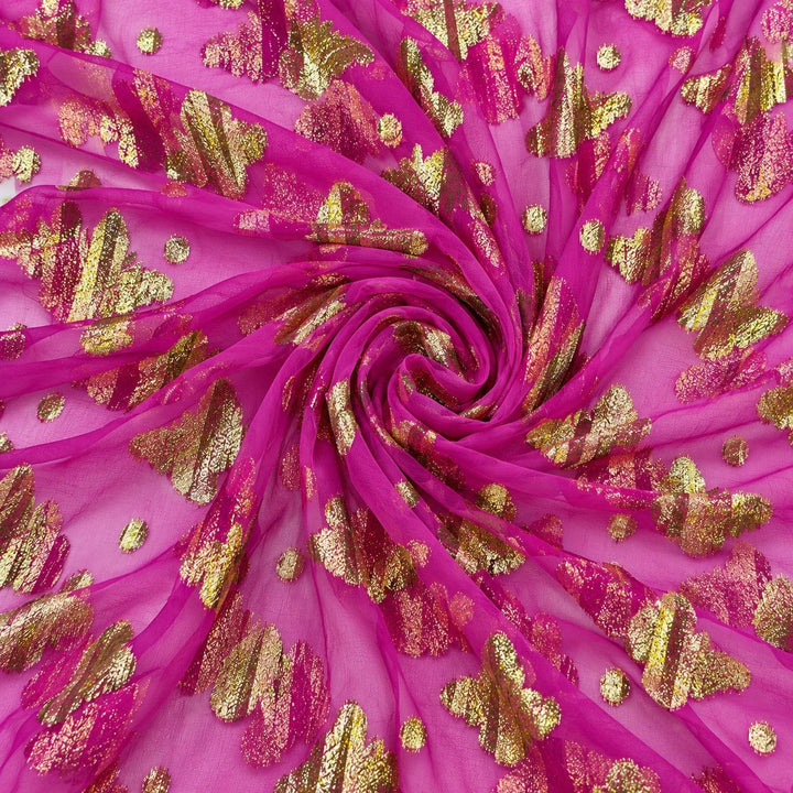 Pink lurex chiffon med gyldne sommerfuglemotiver – stoffet formet som en spiral (billede 1 af 3)