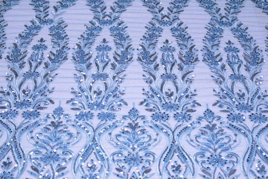 BLÅT TYL STOF MED PAILLETTER OG PERLER