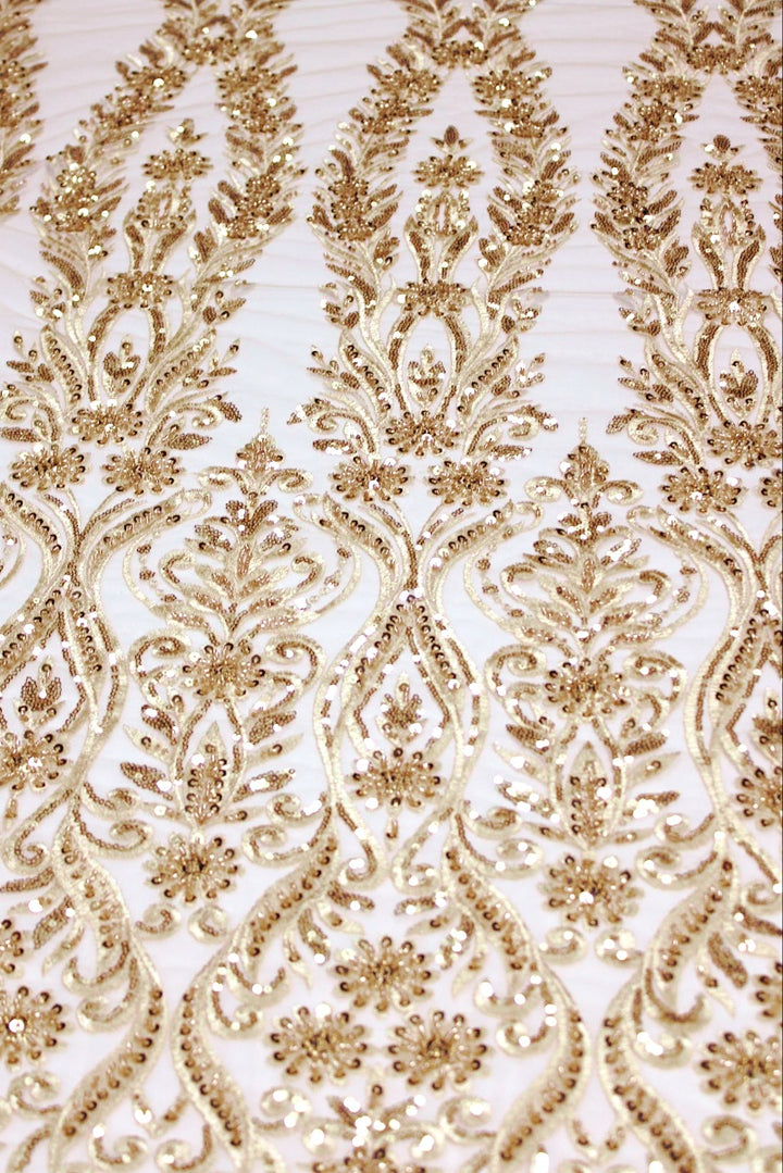 CHAMPAGNEFARVET TYL STOF MED PAILLETTER OG PERLER