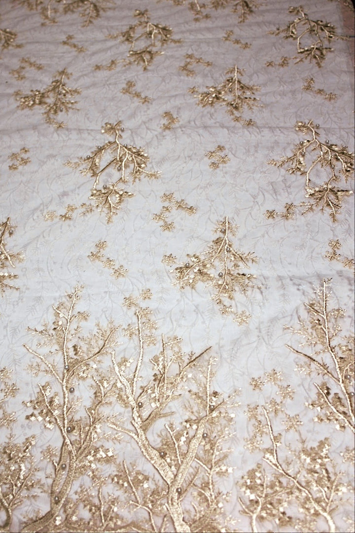 CHAMPAGNE TYL STOF MED BRODEREDE TRÆER