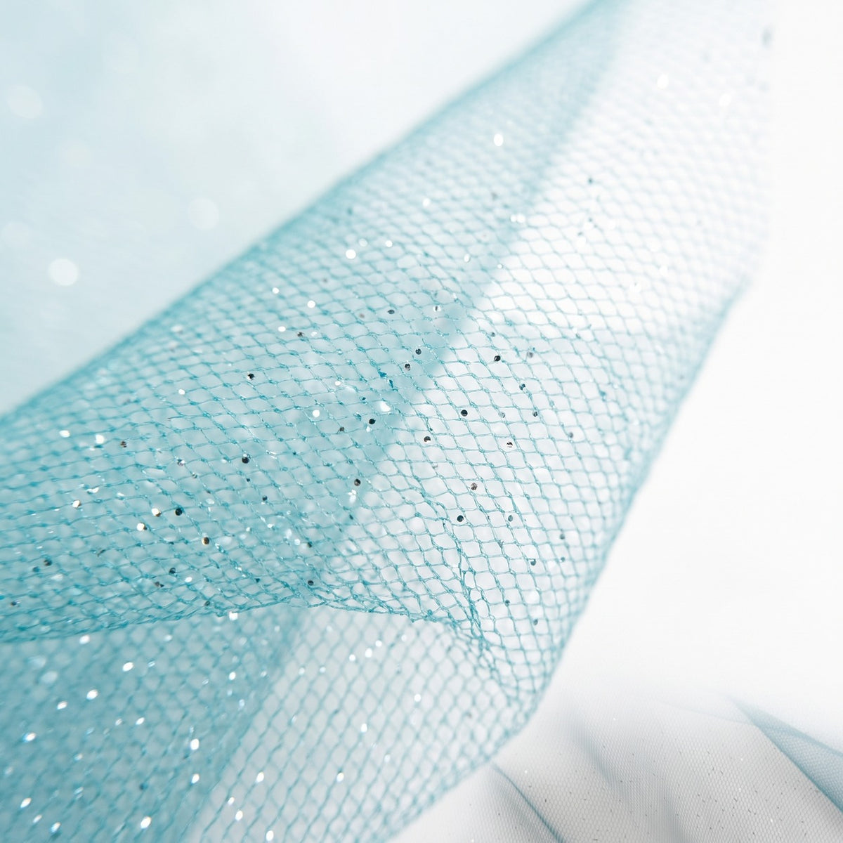 Turkis glitter tyl med metallic — nærbillede af netstruktur og glitter