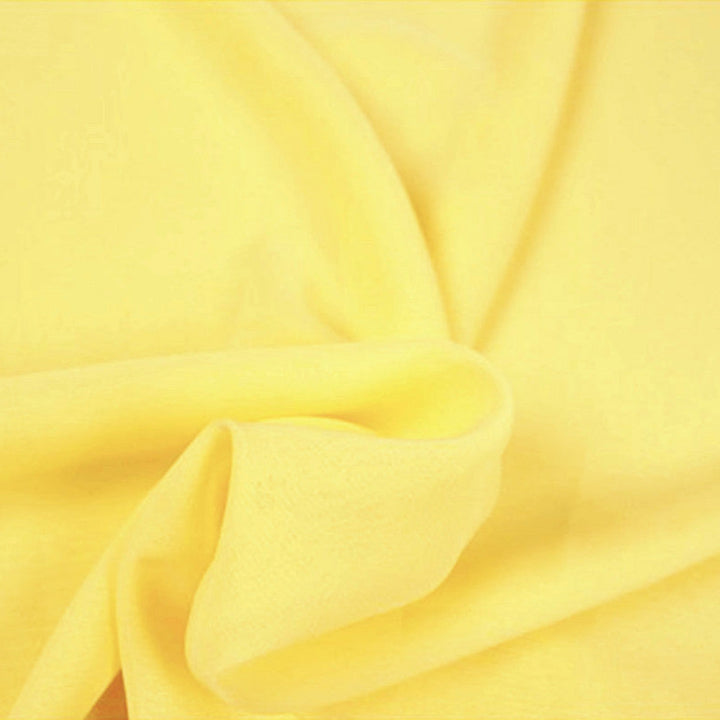 LYS GUL CHIFFON – LET, GENNEMSIGTIG & MED FLOT FALD