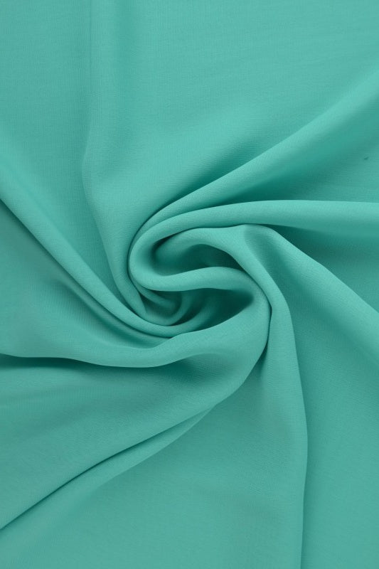 TURKIS CHIFFON – LET, GENNEMSIGTIG & MED FLOT FALD