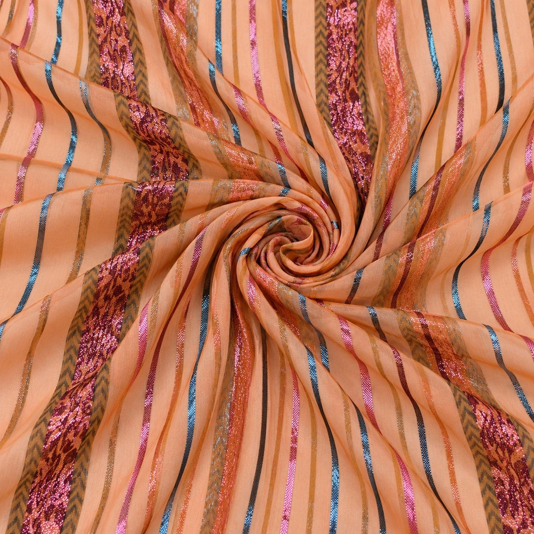 Ferskenorange lurex chiffonsilk med flerfarvede glitrende striber – stoffet formet som en spiral (billede 1 af 3)