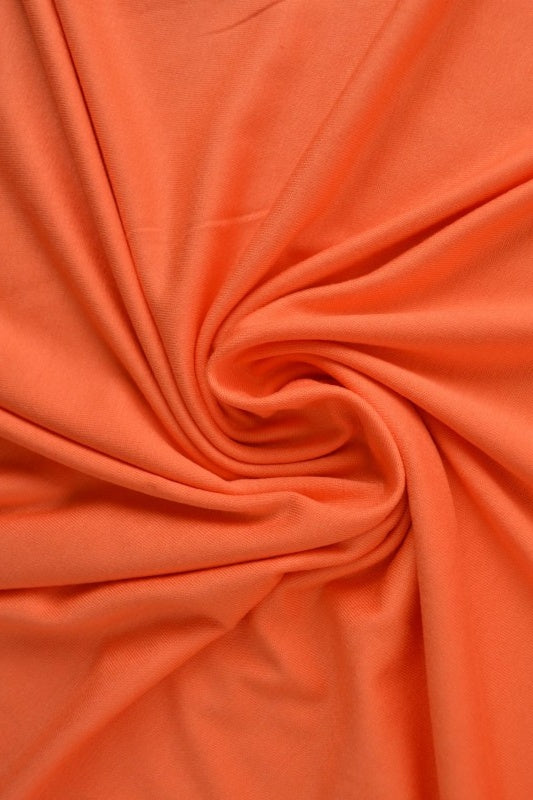 MØRK ORANGE VISKOSE JERSEY – BLØD, ÅNDBAR & STRÆKBAR
