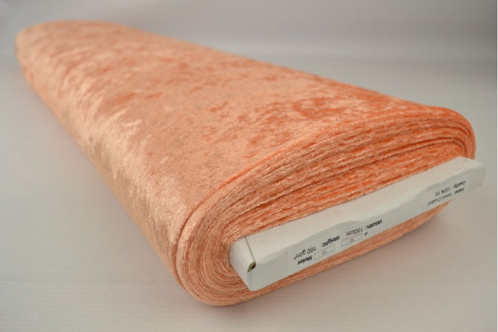 ORANGE NERVØS VELOUR – STRIKKET, STRÆKBAR & GLANSFULDT FALD
