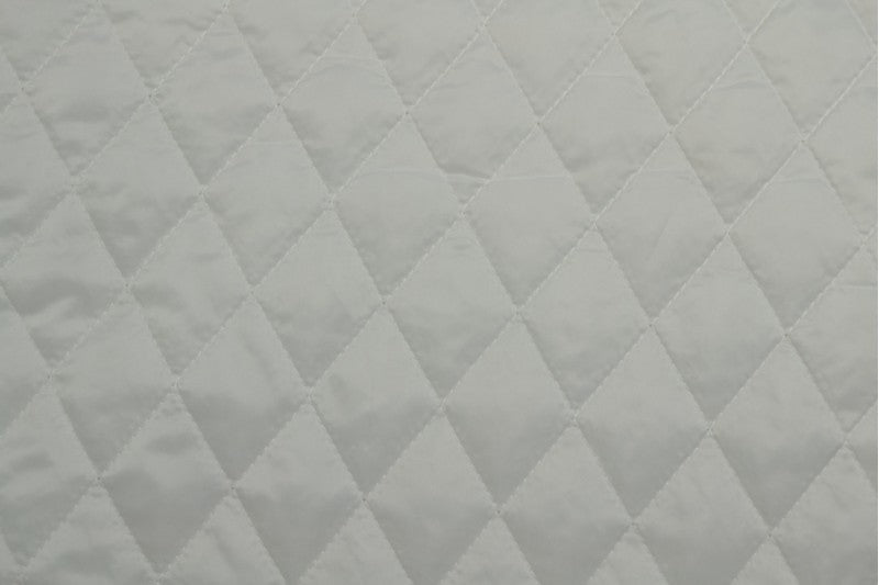 HVID QUILT STOF MED VATTERET BAGSIDE