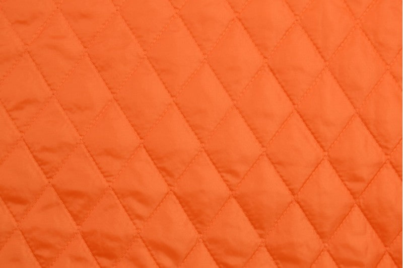 ORANGE QUILT STOF MED VATTERET BAGSIDE