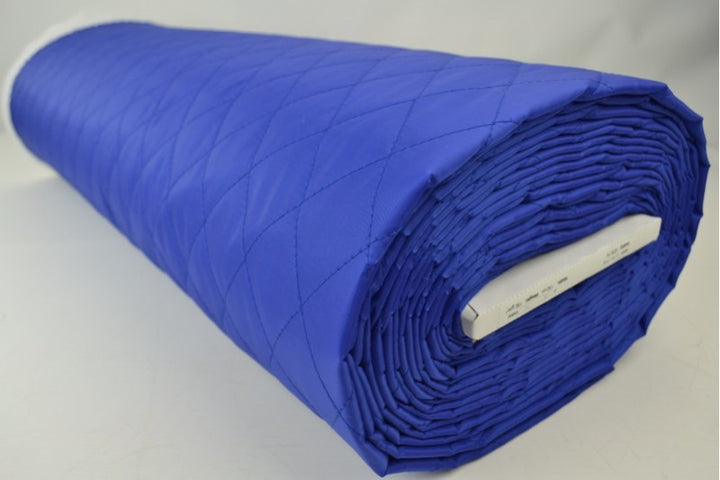 MØRKEBLÅ QUILT STOF MED VATTERET BAGSIDE