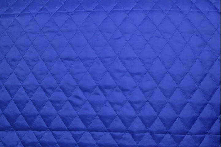 MØRKEBLÅ QUILT STOF MED VATTERET BAGSIDE