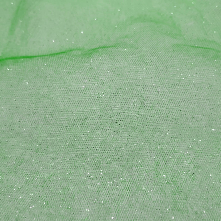 Grøn glitter tyl med metallic — nærbillede af netstruktur og glitter