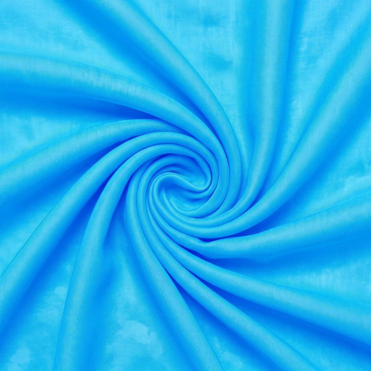 Klar havblå/turkisblå silke chiffon – stoffet samlet i en blød swirl med misfarvningen synlig (billede 1 af 2)