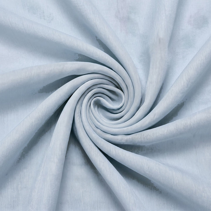 Lysegrå silke chiffon – stoffet samlet i en blød swirl med lyse misfarvninger i højre side (billede 1 af 2)