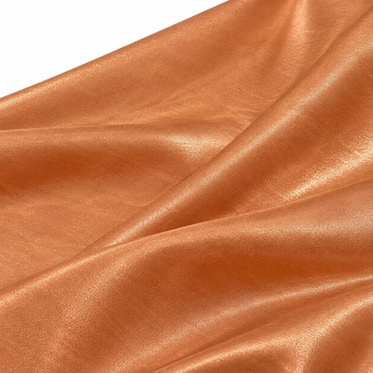Metallic lys kobber foil stof — nærbillede af foliens struktur og glans
