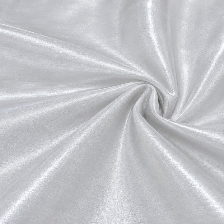 Metallic perlehvid foil stof — nærbillede af foliens struktur og glans
