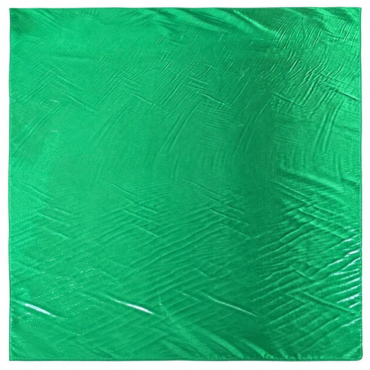 Metallic vintage grøn foil stof — stoffet liggende fladt med bløde folder