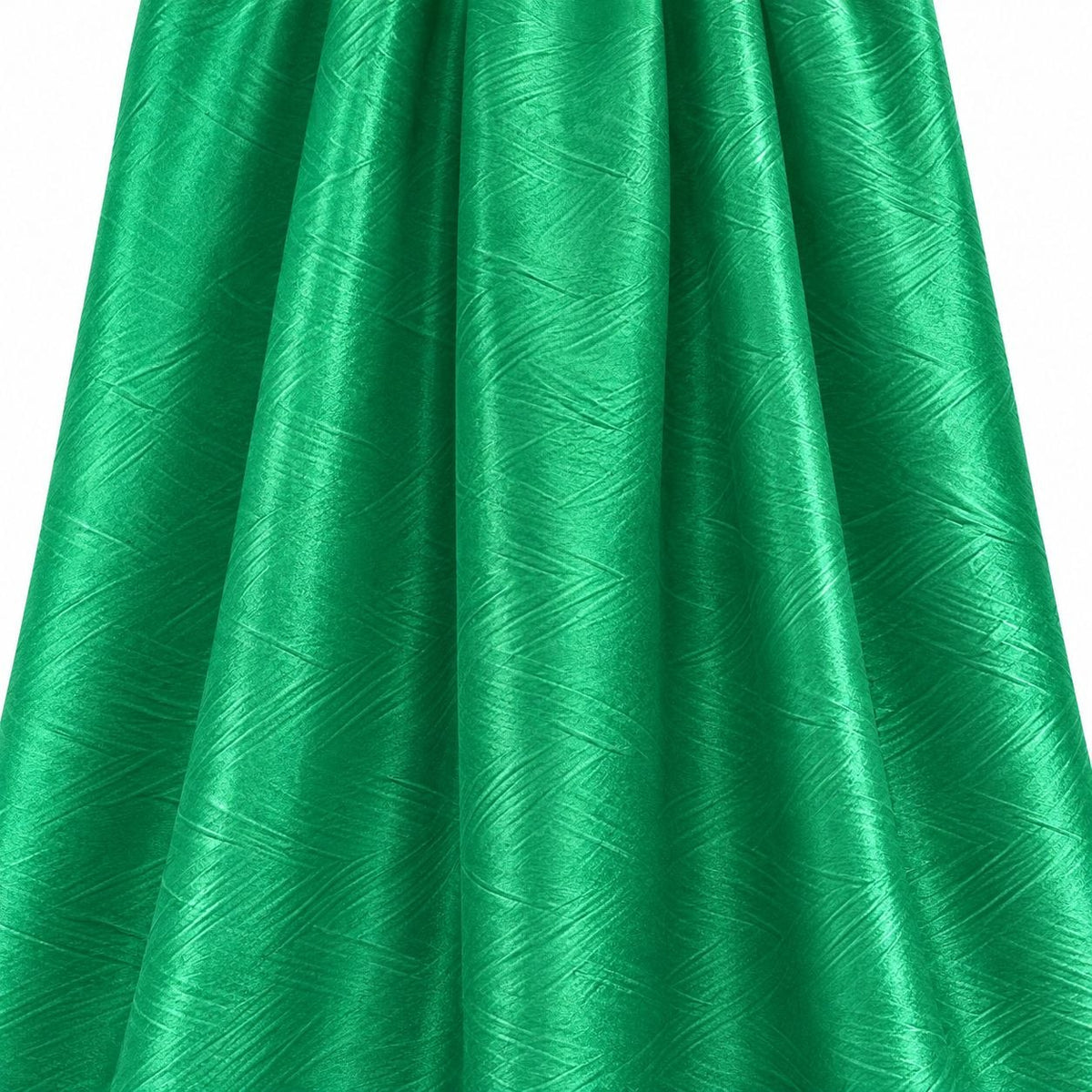 Metallic vintage grøn foil stof — hængende og draperet, folien fanger lyset