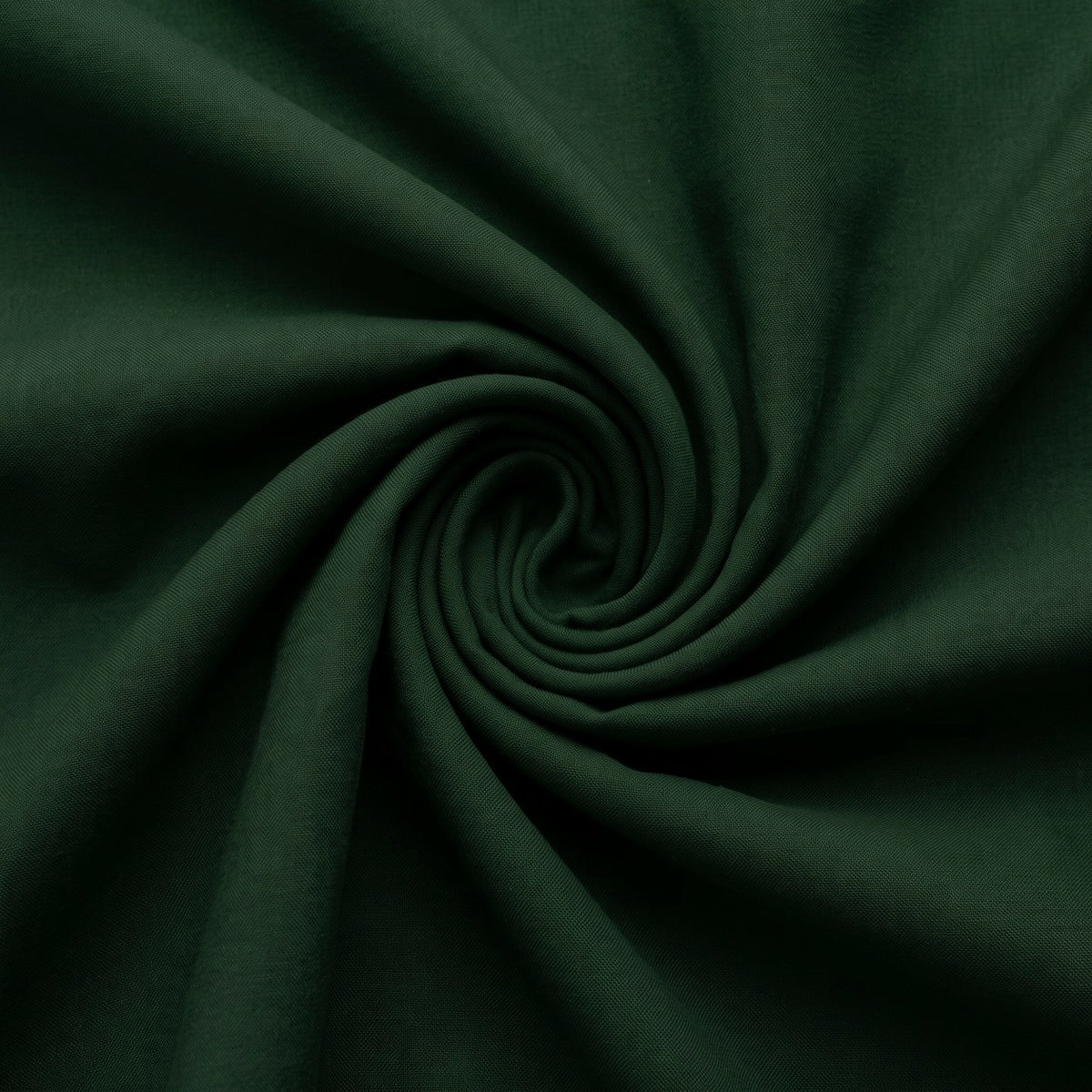 Mørkegrønt micro velour stof – stoffet samlet i en blød swirl (billede 1 af 3)