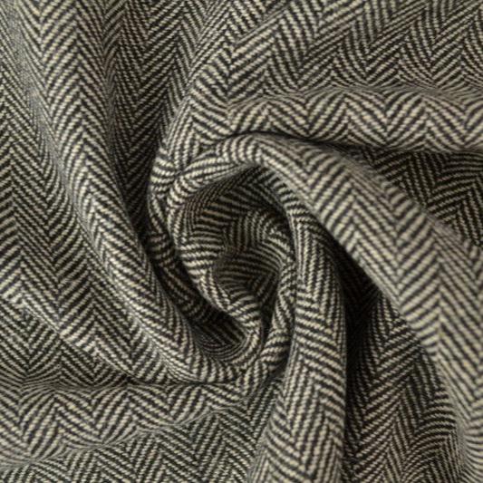 BEIGE ULD/POLYESTER STOF MED TWEEDSTRUKTUR OG SILDEBENSMØNSTER