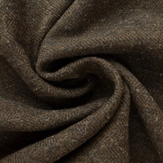 BRUN ULD/POLYESTER STOF MED TWEEDSTRUKTUR MED SILDEBENSMØNSTER