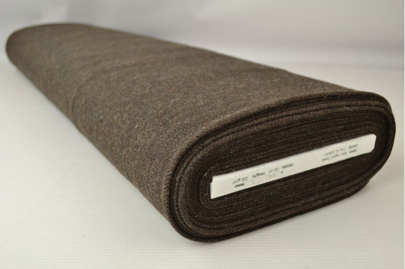 BRUN ULD/POLYESTER STOF MED TWEEDSTRUKTUR MED SILDEBENSMØNSTER