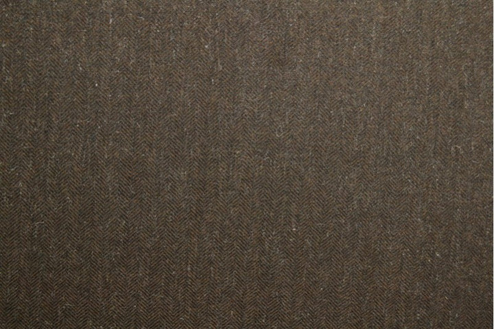 BRUN ULDSTOF MED TWEEDSTRUKTUR MED SILDEBENSMØNSTER