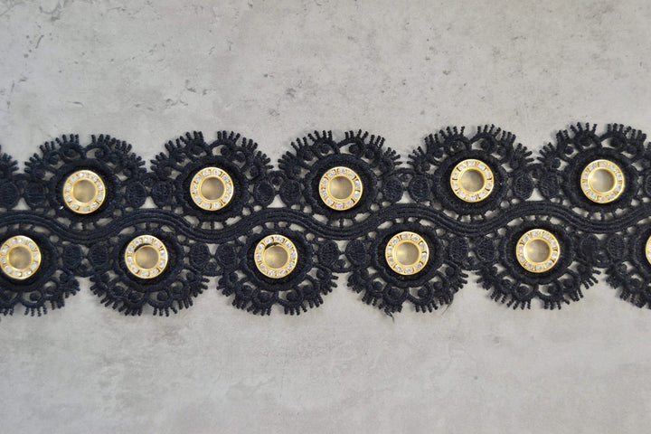 SORT BLOMSTERBÅND MED GULD RINGE 55MM